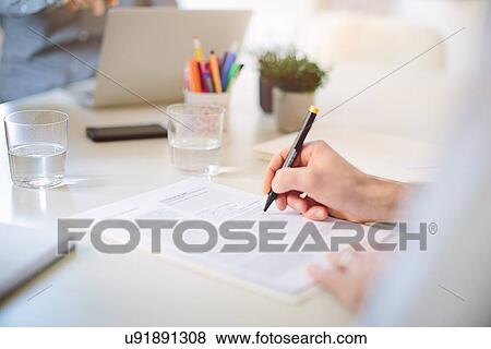 Cropped view of businessman signing contract View Large Photo Image Stock Photo - Cropped view of businessman signing contract. Fotosearch