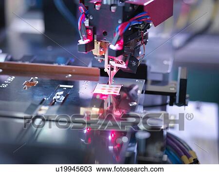 "Electronic component in testing machine, close up" View Large Photo Image Stock Image - "Electronic component in testing machine, close up". Fotosearch