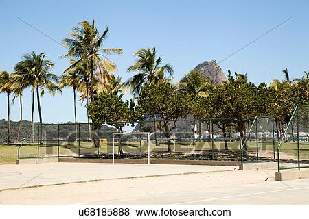 "Empty basketball and soccer court in front of Sugarloaf mountain, Rio De Janeiro, Brazil" View Large Photo Image Stock Photo - "Empty basketball and soccer court in front of Sugarloaf mountain, Rio De Janeiro, Brazil". Fotosearch