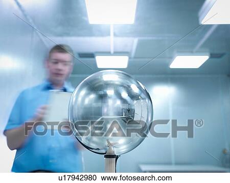 Engineer carrying out electromagnetic field (EMF) testing of electronic lighting using Van Der Hoofden Head View Large Photo Image Stock Image - Engineer carrying out electromagnetic field (EMF) testing of electronic lighting using Van Der Hoofden Head. Fotosearch