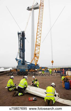 Engineers working on wind turbine View Large Photo Image Stock Photography - Engineers working on wind turbine. Fotosearch