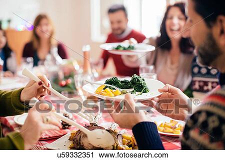 Stock Image - Family Christmas party. Fotosearch