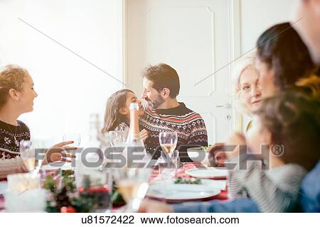 Stock Image - Family Christmas party. Fotosearch