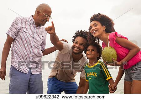 "Family of four looking up from Ipanema beach, Rio De Janeiro, Brazil" View Large Photo Image Stock Image - "Family of four looking up from Ipanema beach, Rio De Janeiro, Brazil". Fotosearch