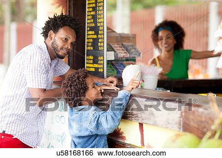 "Father and son choosing at beach bar on Ipanema beach, Rio De Janeiro, Brazil" View Large Photo Image Stock Photograph - "Father and son choosing at beach bar on Ipanema beach, Rio De Janeiro, Brazil". Fotosearch