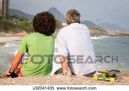 "Father and son, Ipanema Beach, Rio de Janeiro, Brazil" View Large Photo Image Stock Photography - "Father and son, Ipanema Beach, Rio de Janeiro, Brazil". Fotosearch