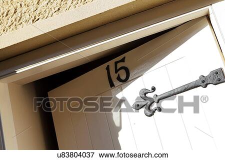 Stock Photo - "Front door, open ajar, number fifteen". Fotosearch