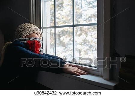 Girl looking out of window View Large Photo Image Stock Image - Girl looking out of window. Fotosearch