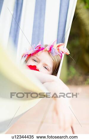 Girl lying in hammock View Large Photo Image Stock Photography - Girl lying in hammock. Fotosearch