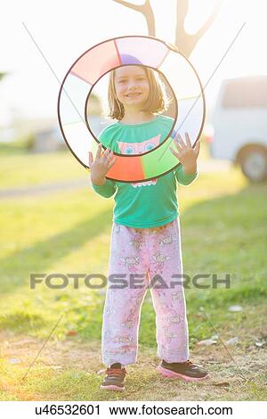 Girl playing frisbee View Large Photo Image Stock Image - Girl playing frisbee. Fotosearch
