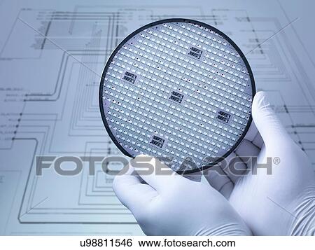 "Gloved hands holding silicon wafer in laboratory, close up" View Large Photo Image Stock Photograph - "Gloved hands holding silicon wafer in laboratory, close up". Fotosearch