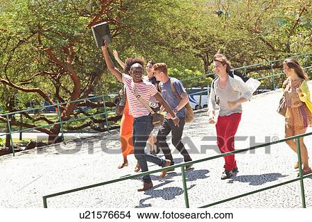 Group of students walking View Large Photo Image Picture - Group of students walking. Fotosearch