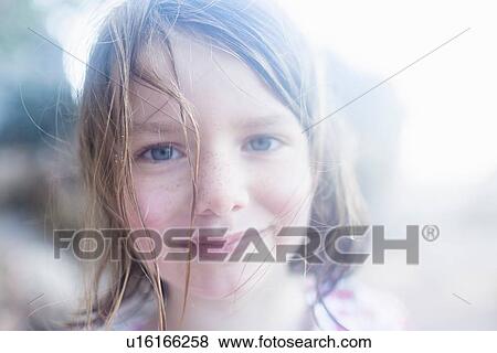 Happy and contented girl View Large Photo Image Stock Photo - Happy and contented girl. Fotosearch