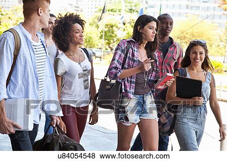 Stock Photo - Higher education students walking. Fotosearch