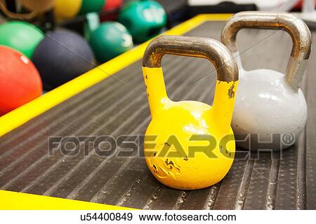 Stock Photo - "Kettle bell weights, close-up". Fotosearch