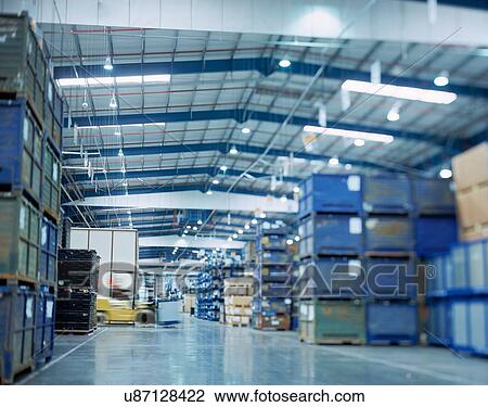 "Large warehouse in car factory, low angle view" View Large Photo Image Stock Image - "Large warehouse in car factory, low angle view". Fotosearch