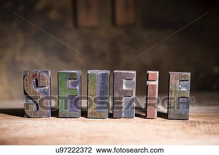 Letterpress letters spelling the word Selfie View Large Photo Image Stock Image - Letterpress letters spelling the word Selfie. Fotosearch