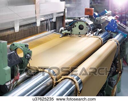Loom weaving kevlar fabric in carbon fibre factory View Large Photo Image Stock Photography - Loom weaving kevlar fabric in carbon fibre factory. Fotosearch
