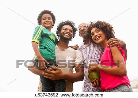 "Low angle view of family of four on Ipanema beach, Rio De Janeiro, Brazil" View Large Photo Image Stock Image - "Low angle view of family of four on Ipanema beach, Rio De Janeiro, Brazil". Fotosearch