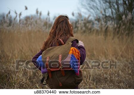 Stock Image - Man in countryside. Fotosearch