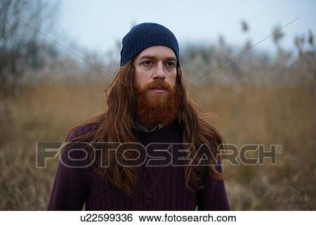 Stock Photograph - Man in countryside. Fotosearch