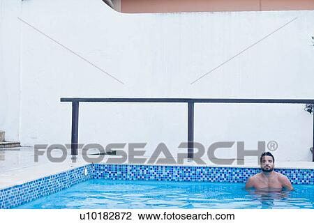 Man in pool View Large Photo Image Stock Image - Man in pool. Fotosearch
