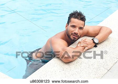 Man in pool View Large Photo Image Stock Image - Man in pool. Fotosearch