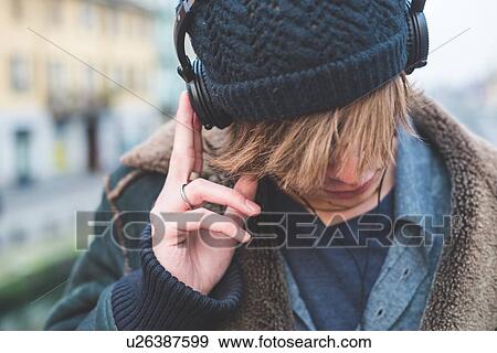 Man wearing headphones View Large Photo Image Stock Photo - Man wearing headphones. Fotosearch