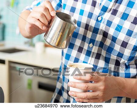 Man working behind coffee bar View Large Photo Image Stock Image - Man working behind coffee bar. Fotosearch