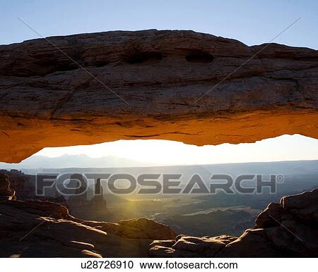 Stock Image - "Mesa Arch at sunrise, in Canyonlands National Park, Utah, USA". Fotosearch