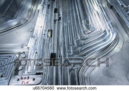 "Metal mould detail in plastics factory, close up" View Large Photo Image Stock Image - "Metal mould detail in plastics factory, close up". Fotosearch