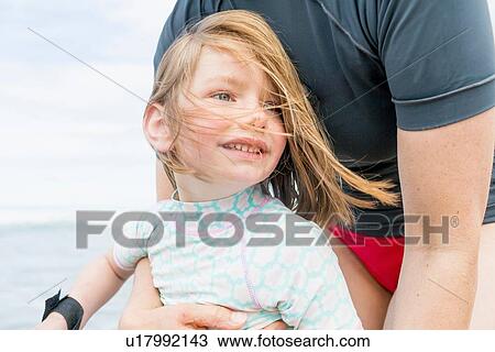 Mother and daughter by the seaside View Large Photo Image Stock Image - Mother and daughter by the seaside. Fotosearch