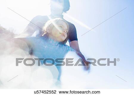 Mother and daughter by the seaside View Large Photo Image Stock Image - Mother and daughter by the seaside. Fotosearch