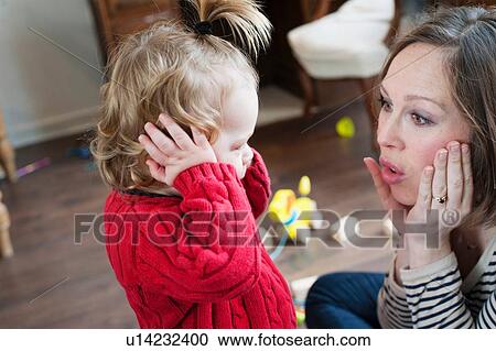 Mother playing with son View Large Photo Image Stock Image - Mother playing with son. Fotosearch