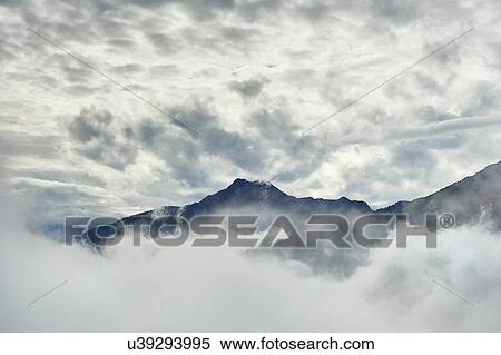 Stock Photography - "Mountains in cloud, Chamois, Italy". Fotosearch