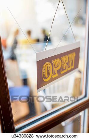 "Open sign on cafe door, close-up" View Large Photo Image Stock Photo - "Open sign on cafe door, close-up". Fotosearch
