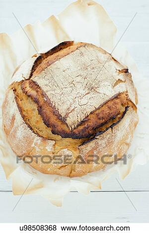 Overhead view of artisan sourdough bread View Large Photo Image Stock Photo - Overhead view of artisan sourdough bread. Fotosearch
