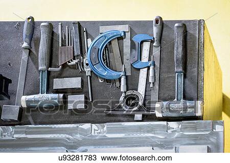 "Overhead view of tools in plastics factory, close up" View Large Photo Image Stock Image - "Overhead view of tools in plastics factory, close up". Fotosearch