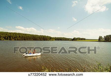"People in dinghy, Rezh River, Sverdlovsk Oblast, Russia" View Large Photo Image Stock Image - "People in dinghy, Rezh River, Sverdlovsk Oblast, Russia". Fotosearch