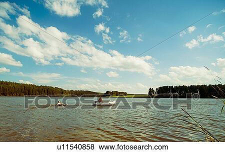 "People in dinghy, Rezh River, Sverdlovsk Oblast, Russia" View Large Photo Image Stock Photo - "People in dinghy, Rezh River, Sverdlovsk Oblast, Russia". Fotosearch