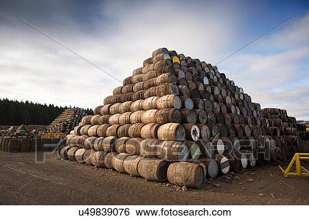 Pile of wooden barrels outside View Large Photo Image Stock Photograph - Pile of wooden barrels outside. Fotosearch