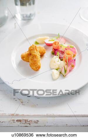 "Plate of fish sticks, radishes and spring onion" View Large Photo Image Stock Photograph - "Plate of fish sticks, radishes and spring onion". Fotosearch