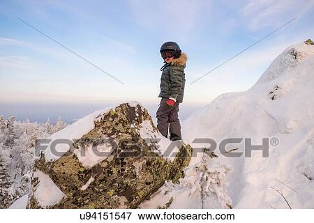 "Portrait of boy standing on snow covered rock, Nizhniy Tagil, Sverdlovsk Region, Russia" View Large Photo Image Stock Photo - "Portrait of boy standing on snow covered rock, Nizhniy Tagil, Sverdlovsk Region, Russia". Fotosearch