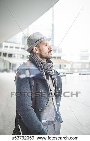 Portrait of businessman gazing behind window View Large Photo Image Stock Photo - Portrait of businessman gazing behind window. Fotosearch