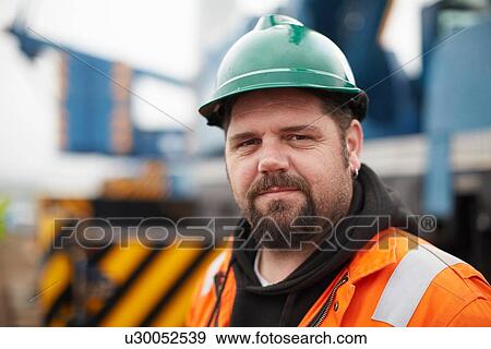 Portrait of engineer at wind farm View Large Photo Image Stock Photo - Portrait of engineer at wind farm. Fotosearch