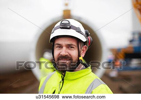 Portrait of engineer at wind farm View Large Photo Image Stock Photo - Portrait of engineer at wind farm. Fotosearch