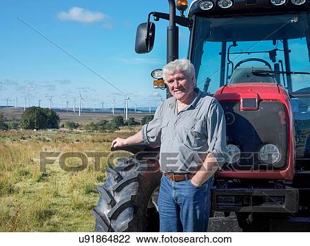 Portrait of farmer and landowner with windfarm in background View Large Photo Image Stock Image - Portrait of farmer and landowner with windfarm in background. Fotosearch