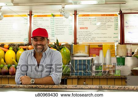 "Portrait of stall holder in juice bar, Copacabana town, Rio De Janeiro, Brazil" View Large Photo Image Stock Image - "Portrait of stall holder in juice bar, Copacabana town, Rio De Janeiro, Brazil". Fotosearch