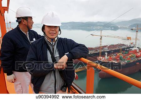 "Portrait of workers at shipping port, GoSeong-gun, South Korea" View Large Photo Image Stock Image - "Portrait of workers at shipping port, GoSeong-gun, South Korea". Fotosearch