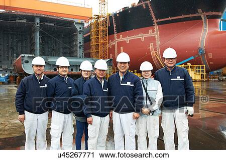 "Portrait of workers at shipyard, GoSeong-gun, South Korea" View Large Photo Image Stock Image - "Portrait of workers at shipyard, GoSeong-gun, South Korea". Fotosearch